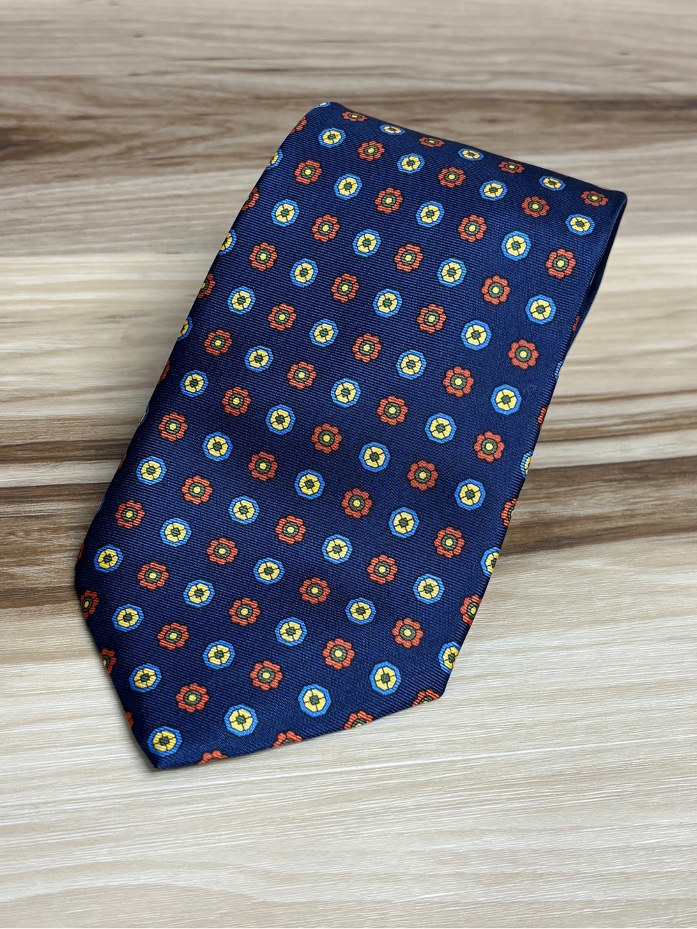 J. Press navy blue blue with various color flower print size 57” by 3.5”